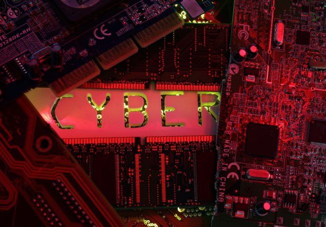 A 3D-printed Cyber word standing on PC motherboard is seen in this illustration picture, October 26, 2017. Picture taken October 26, 2017. REUTERS/Dado Ruvic