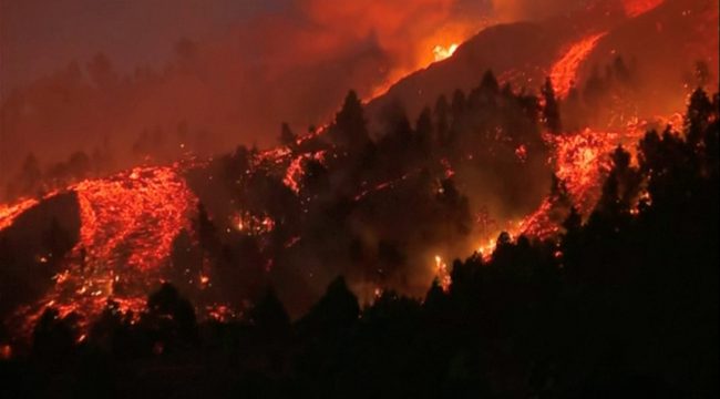 Lava pours out of a volcano on La Palma in Spain’s Canary Islands